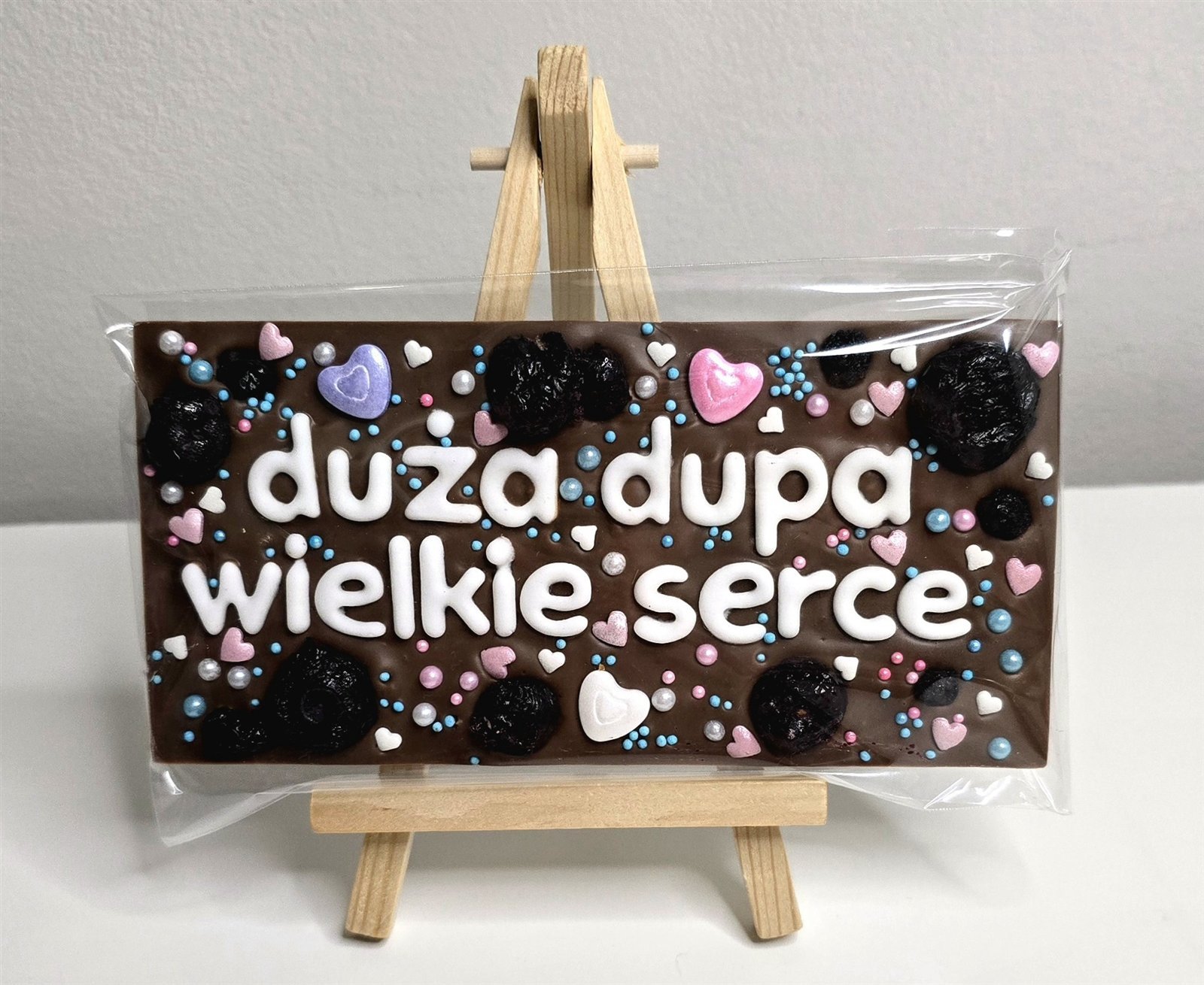 Personalizowana czekolada w przezroczystej folii na stojaku